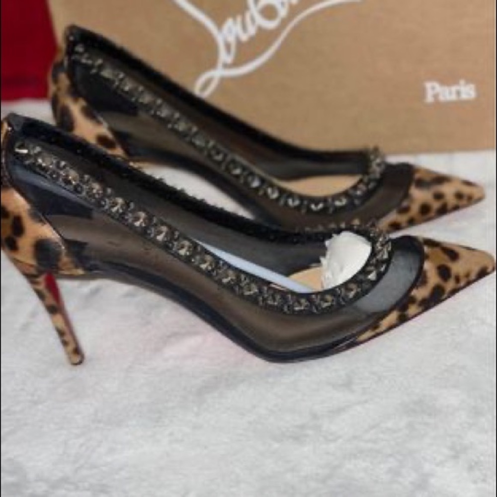 Christian louboutin pumps. With spikes and leopard print